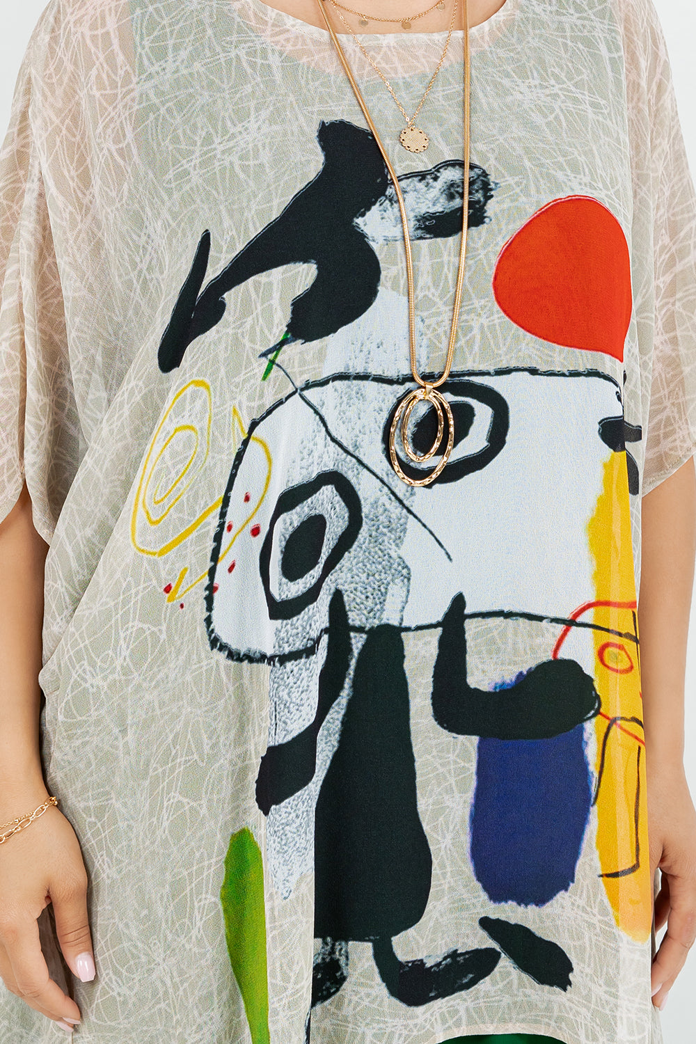 034- Sterling Styles Beige Joan Miro Inspired Poncho