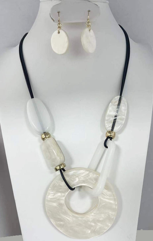 NE-140 White Lucite Orbs and Donut on Black Leather Set