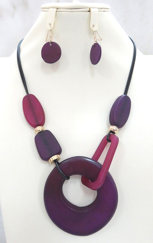 NE-147 Shades of Purple Lucite Orbs and Donut on Black Leather Set