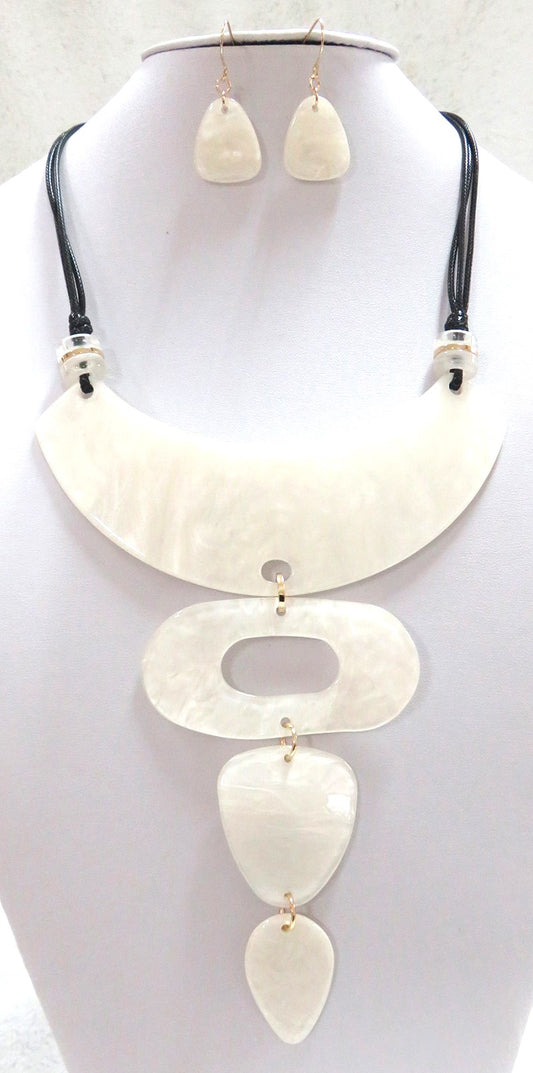 NE-150 Ivory Colored Lucite Medallions on Black Leather