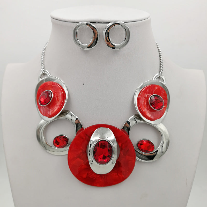 NE-260 Red Lucite with Rhinestones and Silver Medallions