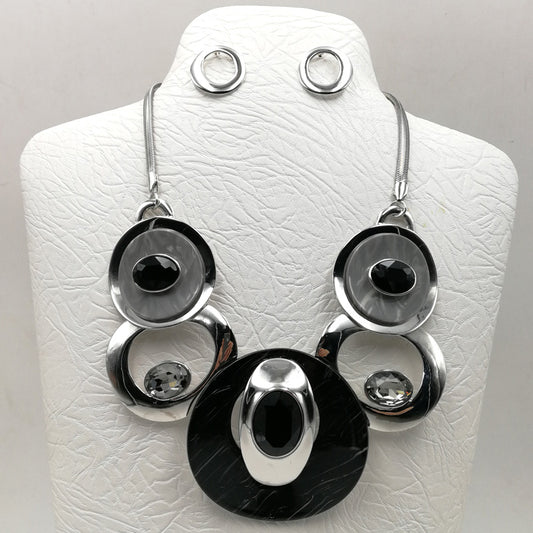 NE-262 Black and Grey Lucite with Rhinestones and Silver Medallions