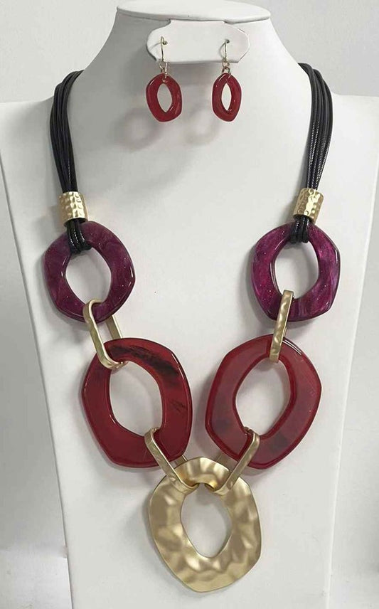 NE-058  Matte Gold and Burgundy Circles on Leather