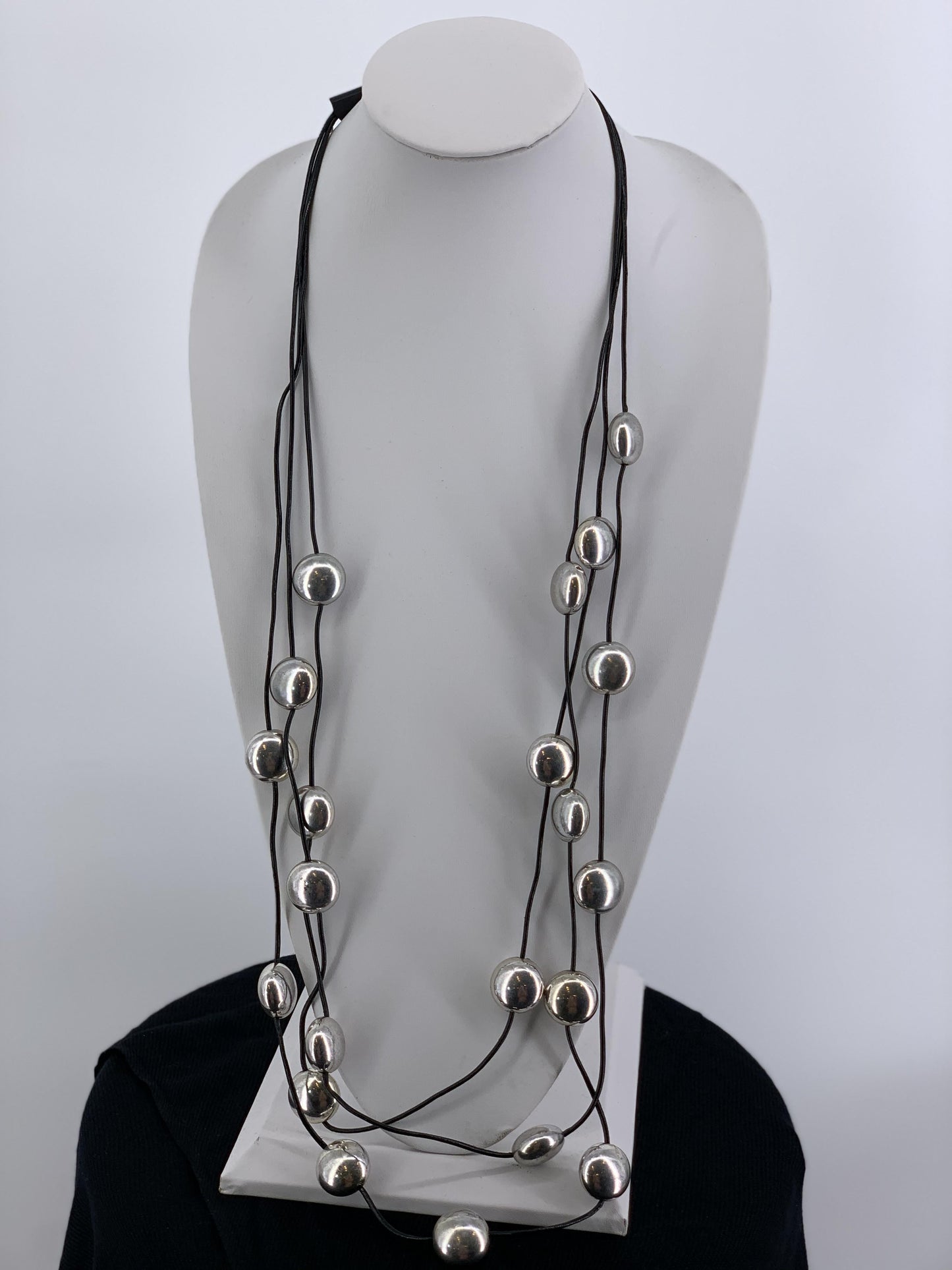N-323     Triple Leather Strand with Silver Beads